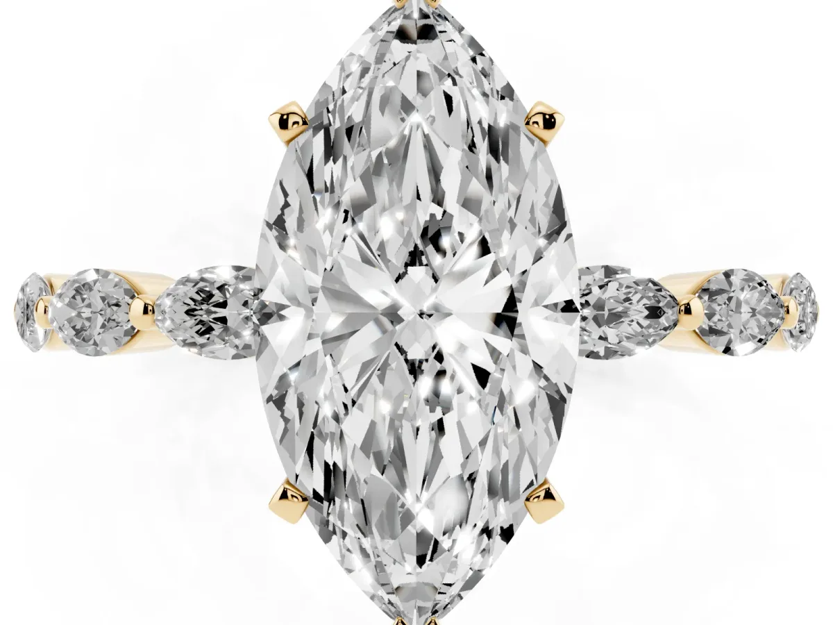 Marquise Cut Diamond Ring with Marquise Side Stones and Prong Setting Yellow gold