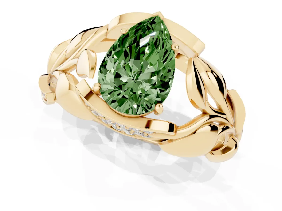 Fancy Green Pear Cut Diamond Leaf-Inspired Engagement Ring with Round Accents and Prong Setting Yellow gold