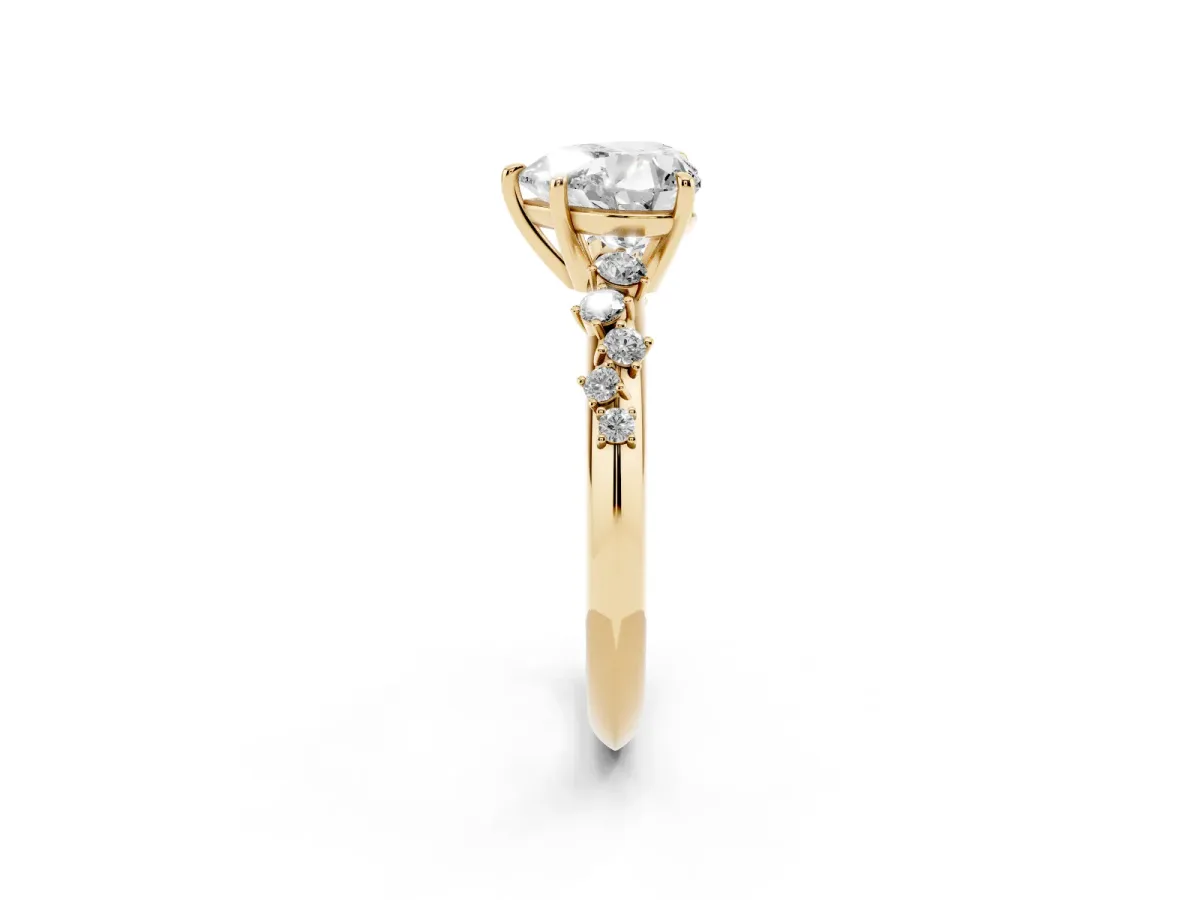 Heart Cut Diamond Cluster Side Stone Solitaire Ring with Prong Setting Yellow gold