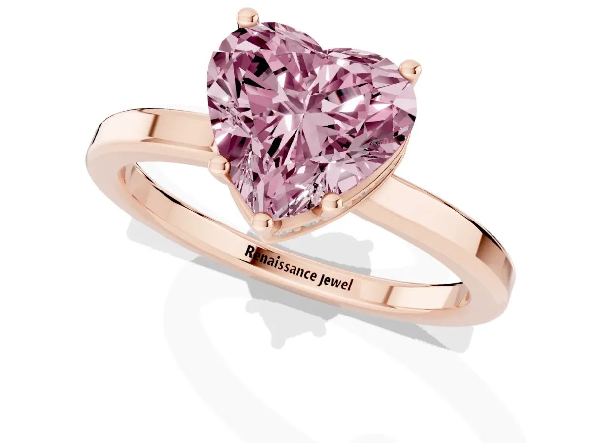 Fancy Pink Heart Cut Cut Solitaire Engagement Ring with Four-Prong Setting on a Classic Band Rose gold