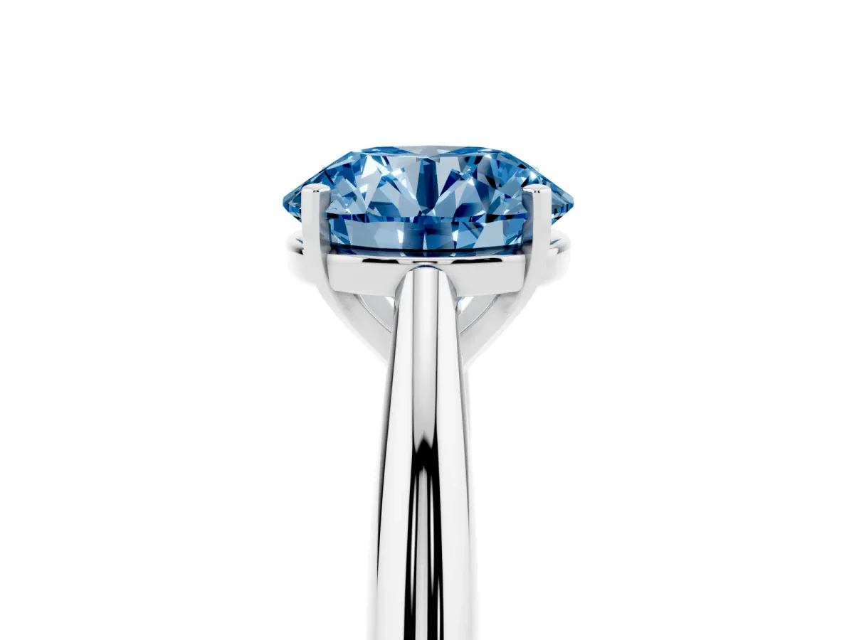 Fancy Blue Round Cut Diamond Solitaire Engagement Ring with Cathedral Setting and Four-Prong Mount Silver