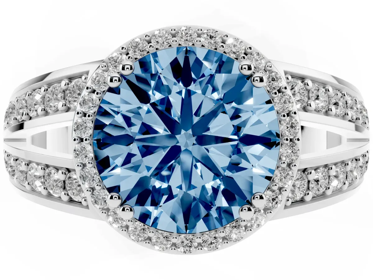 Fancy Blue Round Cut Diamond Halo Ring with Split Shank Pavé Band and Four-Prong Setting Silver