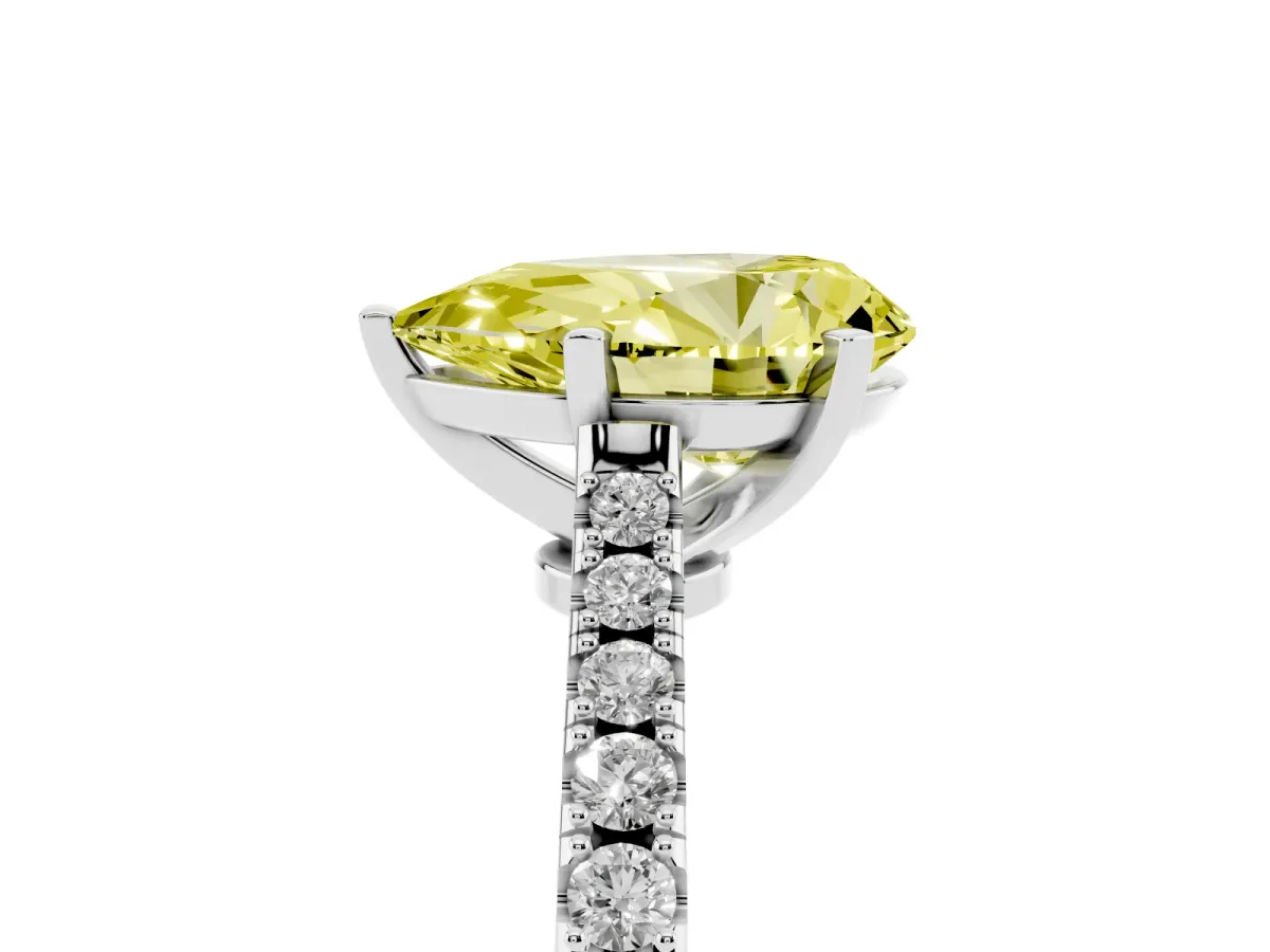 Fancy Yellow Pear Cut Cut Solitaire Diamond Engagement Ring with Pave Band and Four-Prong Setting Platinum