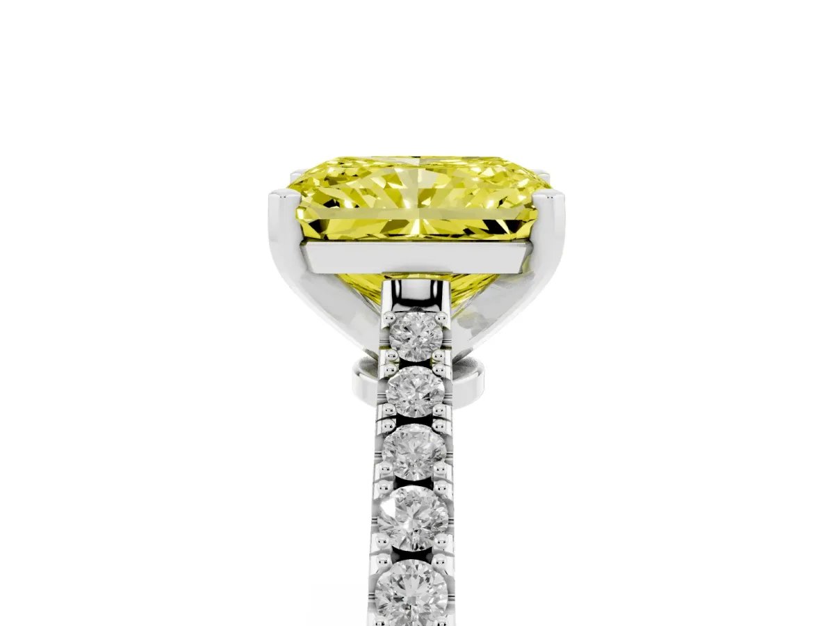 Fancy Yellow Radiant Cut Cut Solitaire Diamond Engagement Ring with Pave Band and Four-Prong Setting Platinum