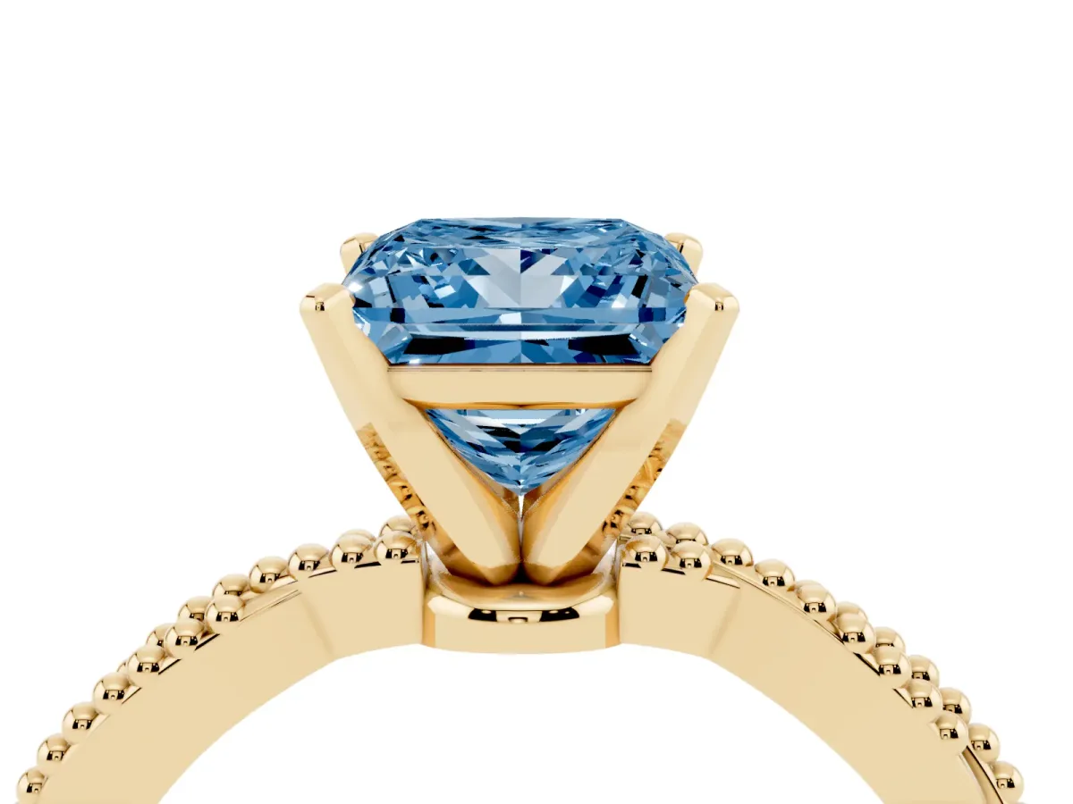 Fancy Blue Princess Cut Solitaire Twisted Band with Bead Prong Setting Yellow gold