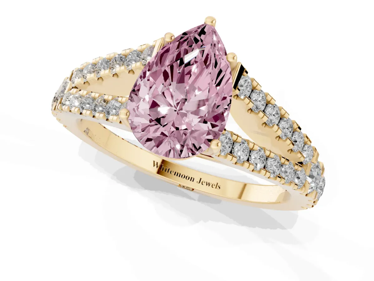 Fancy Pink Pear Cut Diamond Split Shank Pavé Engagement Ring with Four-Prong Setting Yellow gold