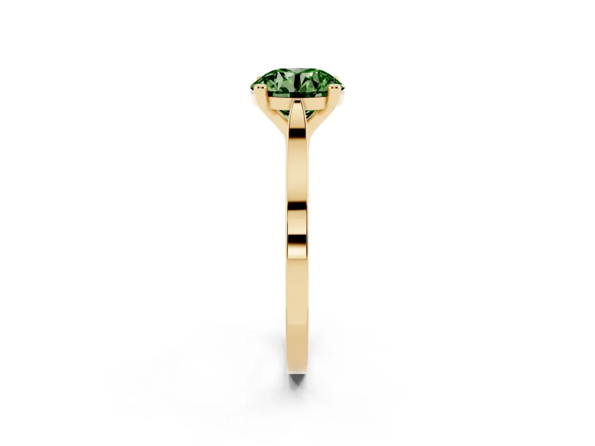 Fancy Green Round Cut Solitaire Diamond Ring with Four-Prong Setting and Tapered Band Yellow gold