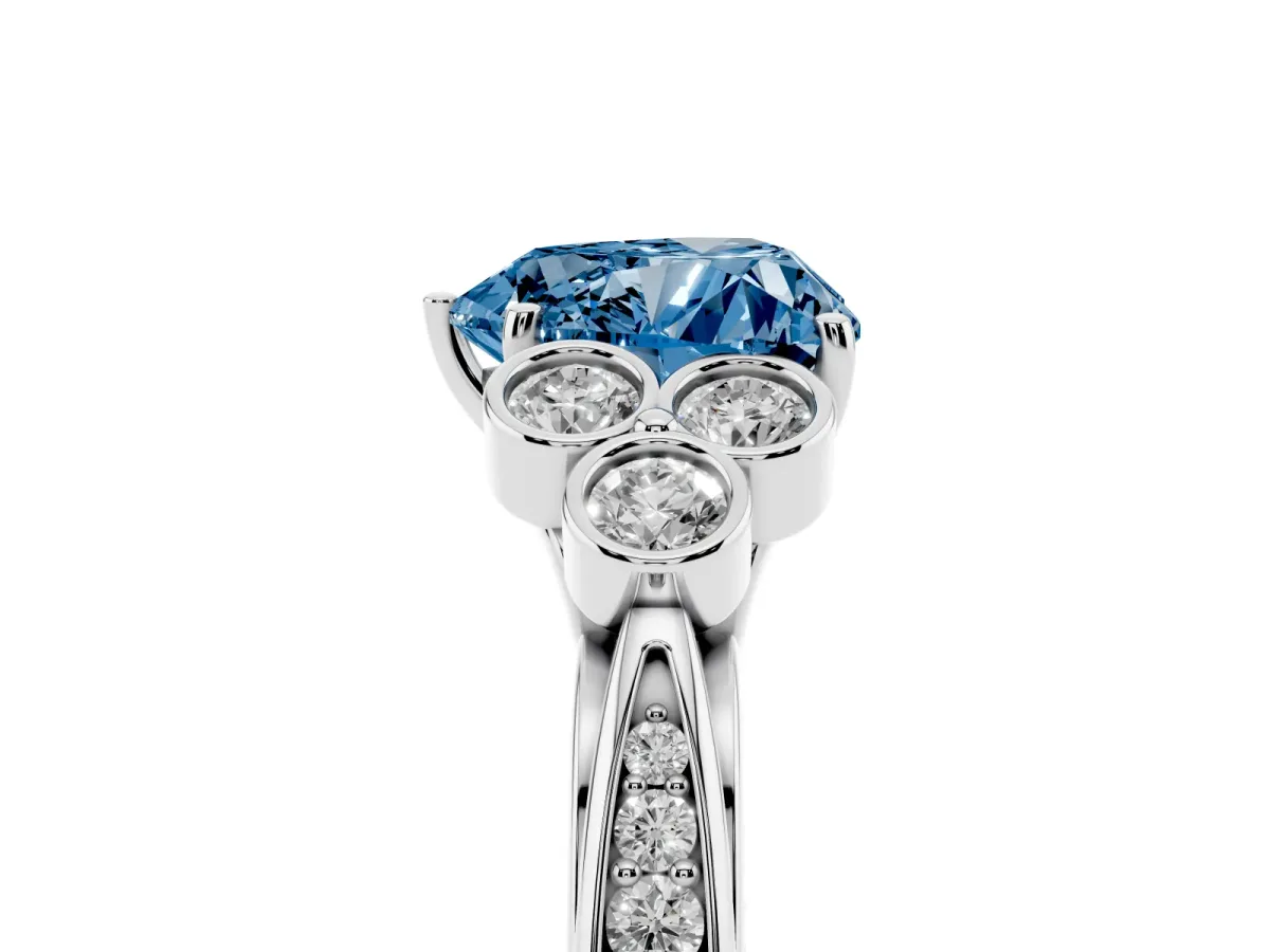 Fancy Blue Heart Cut Cut Diamond Engagement Ring with Bezel Set Round Side Stones and Prong Setting Silver