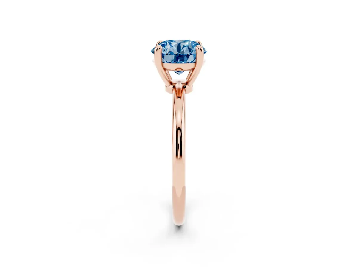 Fancy Blue Round Cut Solitaire Diamond Ring with 4-Prong Setting on a Classic Band Rose gold