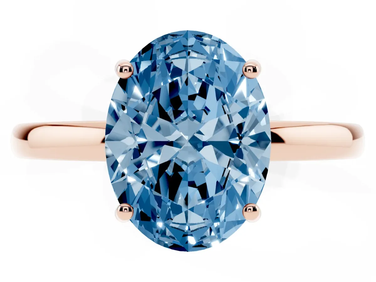 Fancy Blue Oval Cut Solitaire Diamond Ring with Prong Setting and Plain Band Rose gold