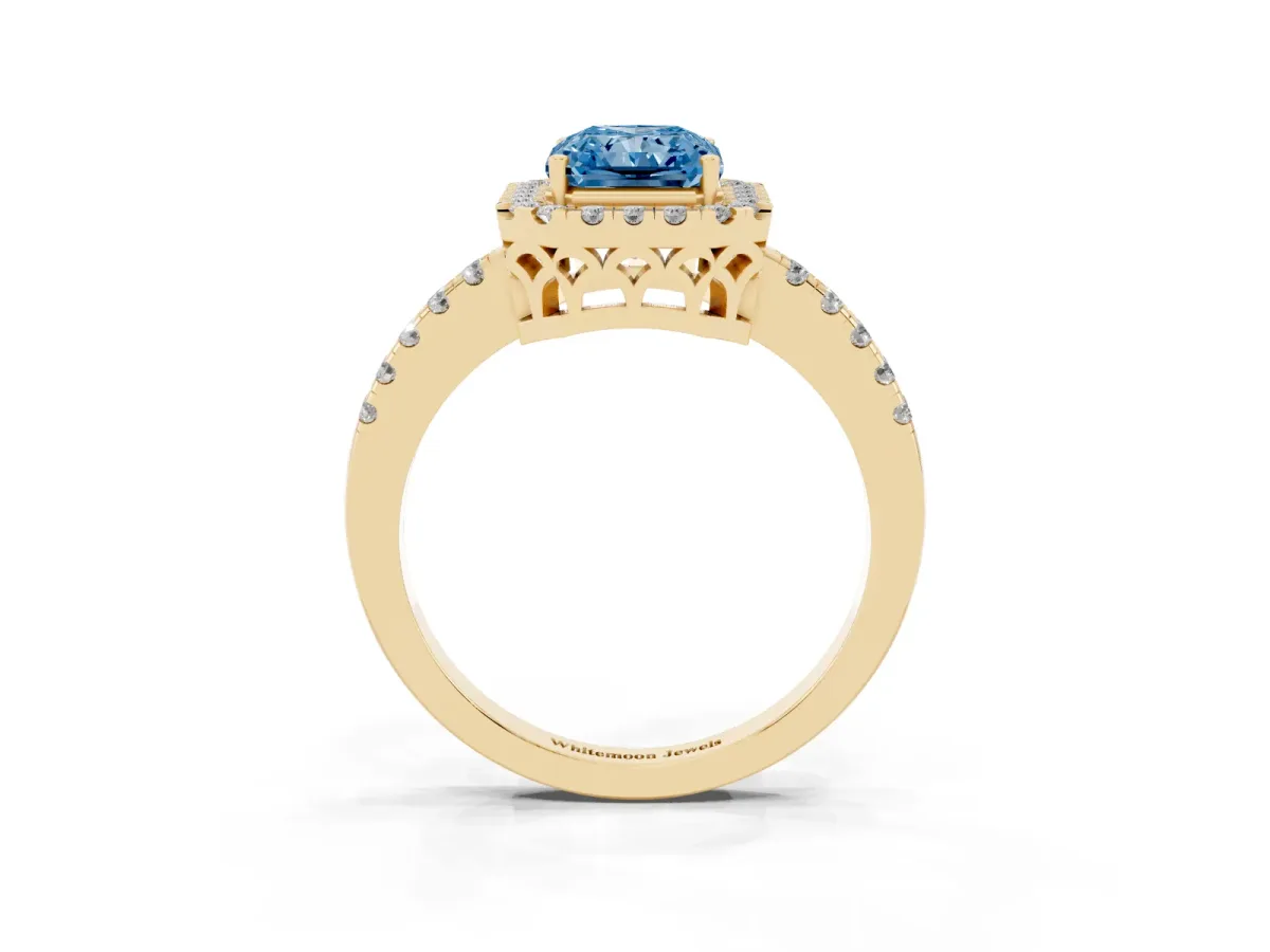 Fancy Blue Radiant Cut Halo Diamond Engagement Ring with Pavé Band and Four-Prong Setting Yellow gold
