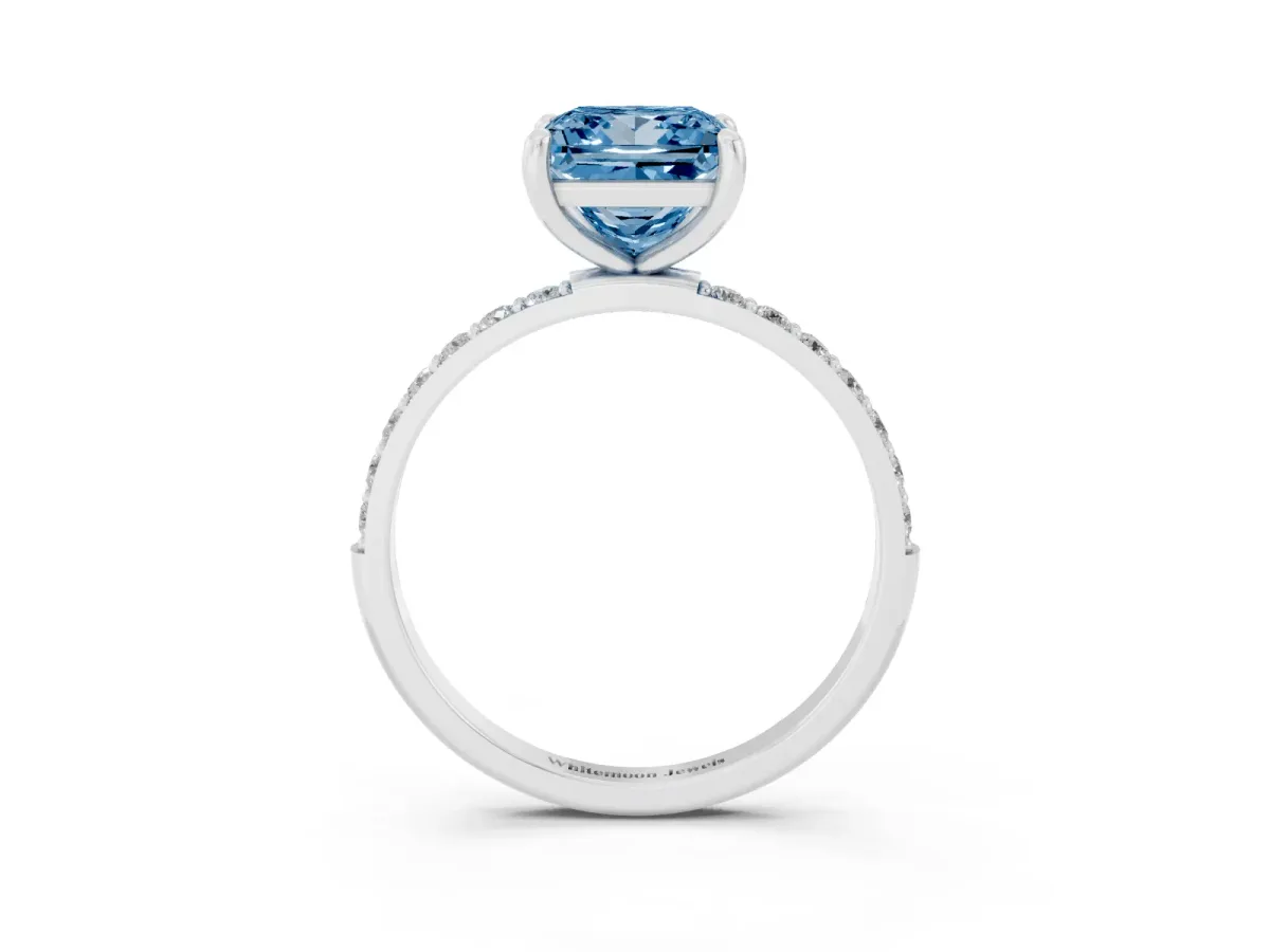 Fancy Blue Princess Cut Diamond Solitaire Ring with Round Pavé Band and Prong Setting Silver