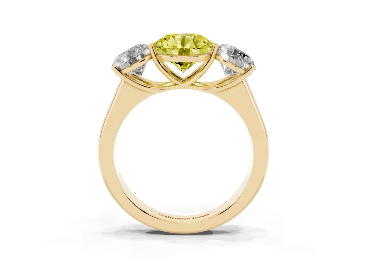 Fancy Yellow Round Cut Three-Stone Diamond Ring with Prong Setting on a Classic Band Yellow gold