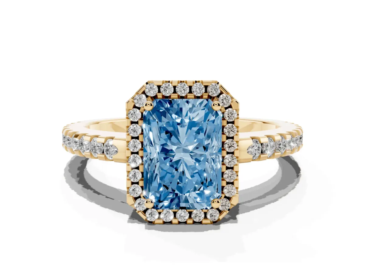 Fancy Blue Radiant Cut Diamond Halo Engagement Ring with Pavé Band and Prong Setting Yellow gold
