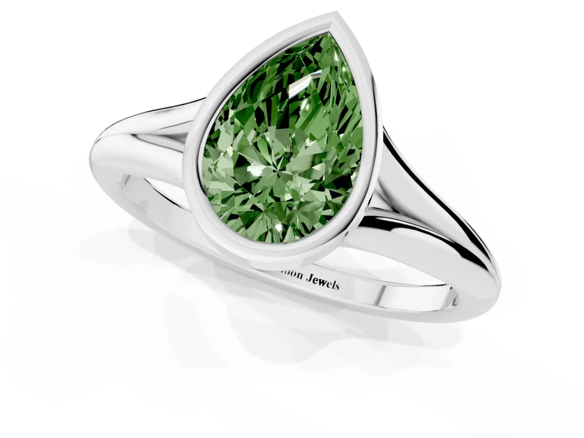 Fancy Green Bezel Set Pear Cut Cut Solitaire Ring with Tapered Band Silver