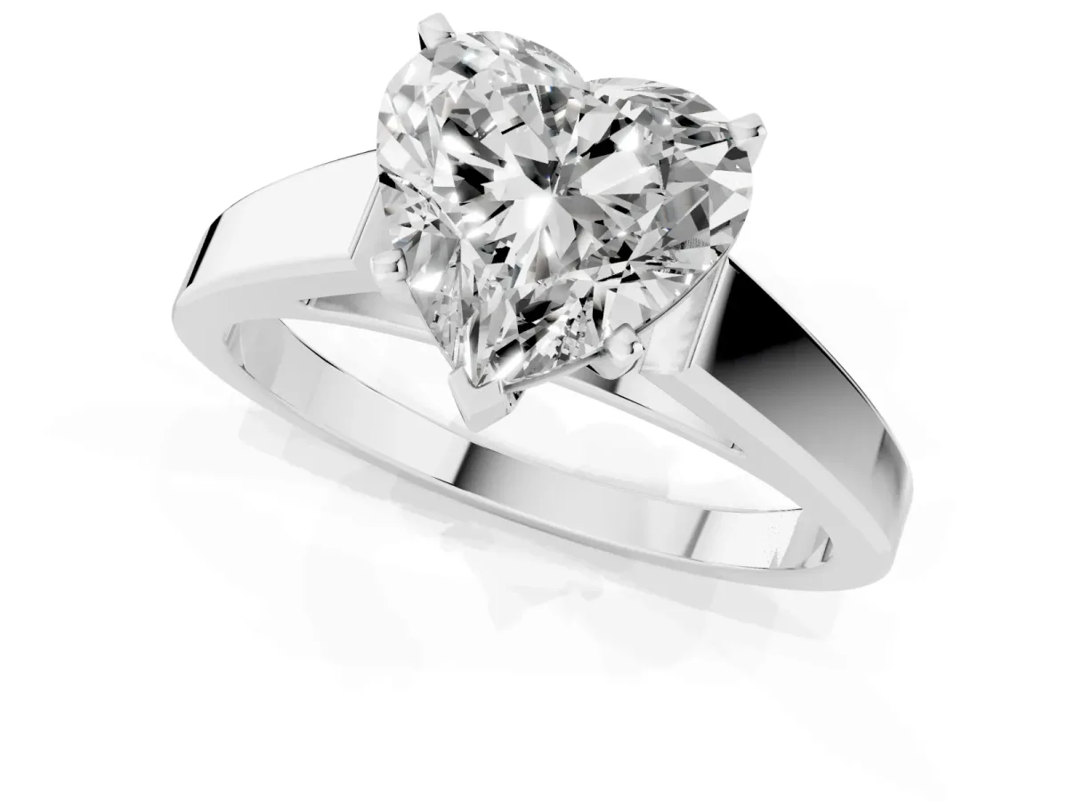Heart Cut Solitaire Engagement Ring with Four-Prong Setting and Tapered Band Silver
