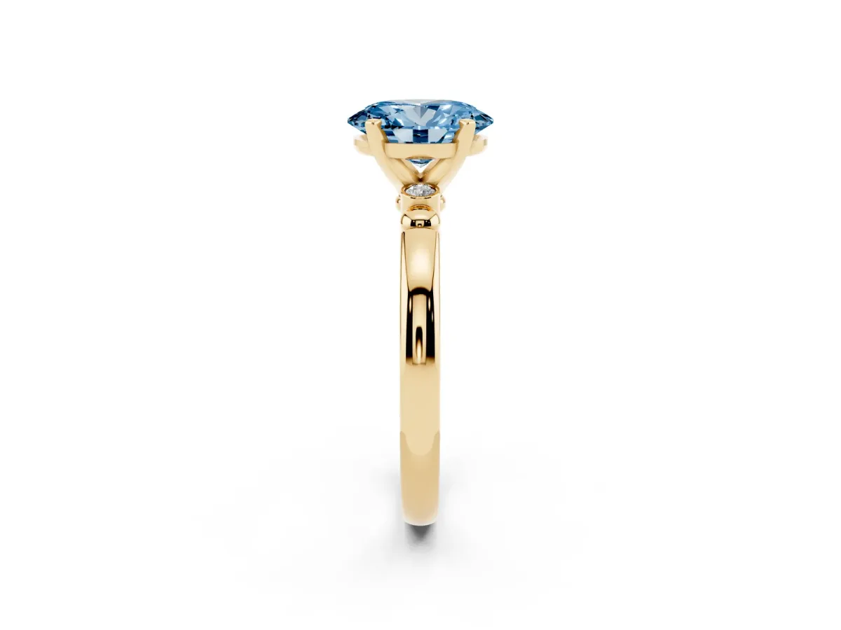 Fancy Blue Oval Cut Solitaire Beaded Band with Four-Prong Setting Yellow gold