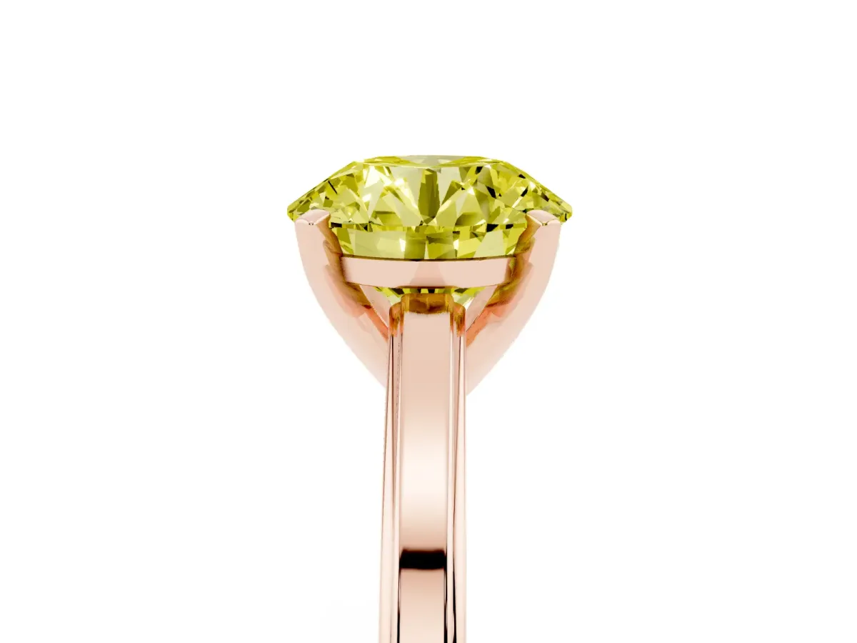Fancy Yellow Round Cut Solitaire Diamond Ring with Four-Prong Setting and Classic Band Rose gold