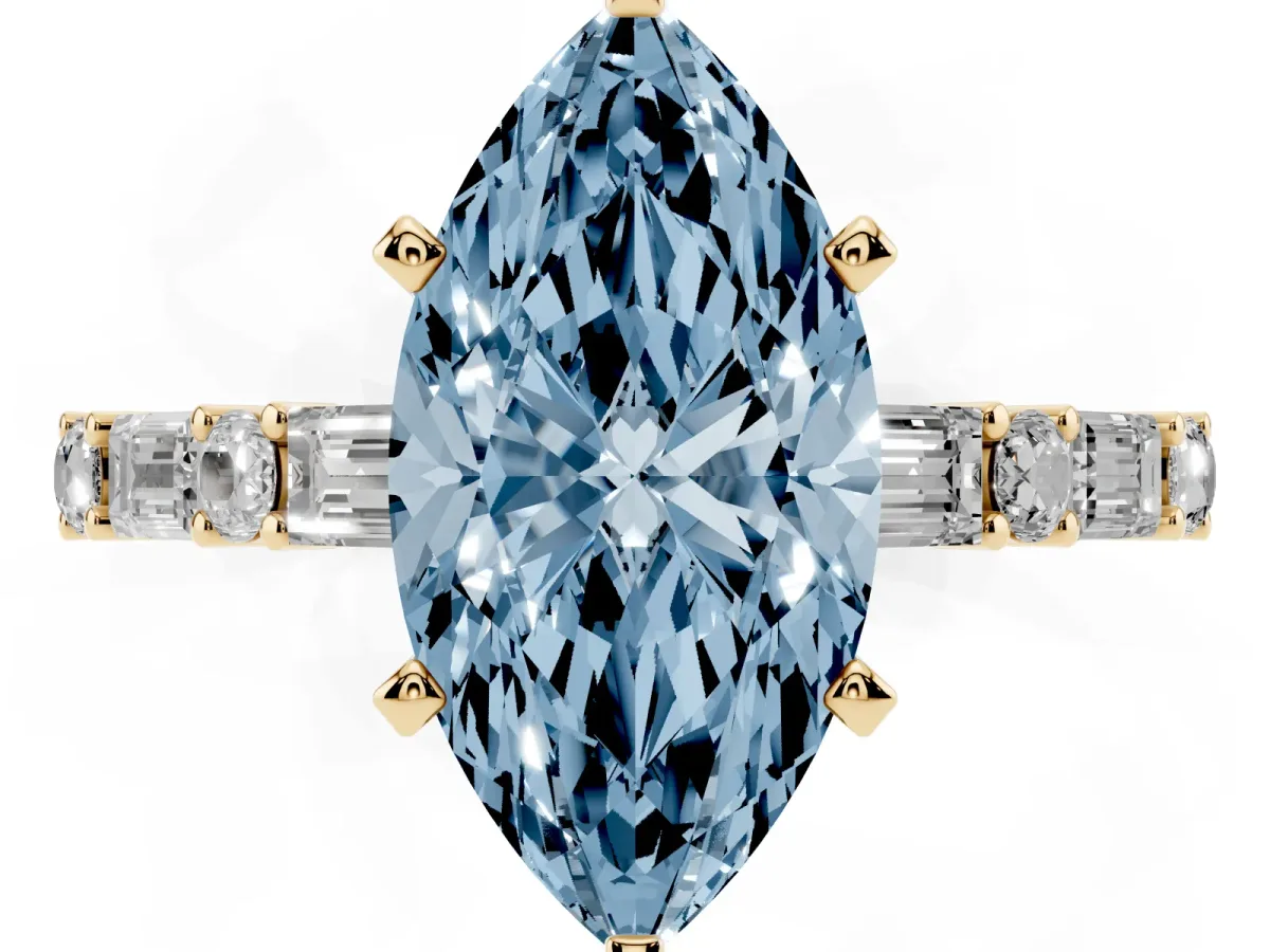 Fancy Blue Marquise Cut Diamond Solitaire with Side Baguettes and Channel Set Band Yellow gold