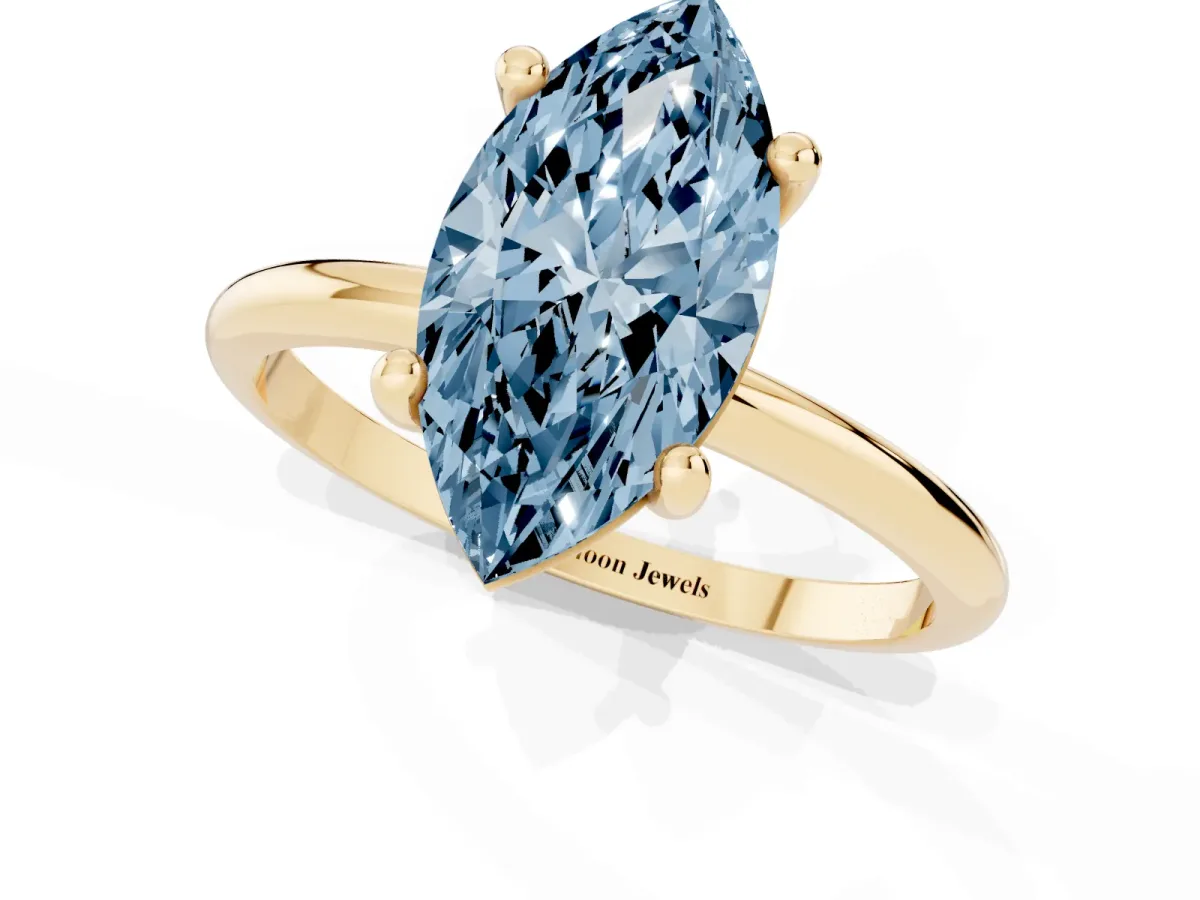Fancy Blue Marquise Cut Solitaire Diamond Ring with 4-Prong Setting on a Classic Band Yellow gold