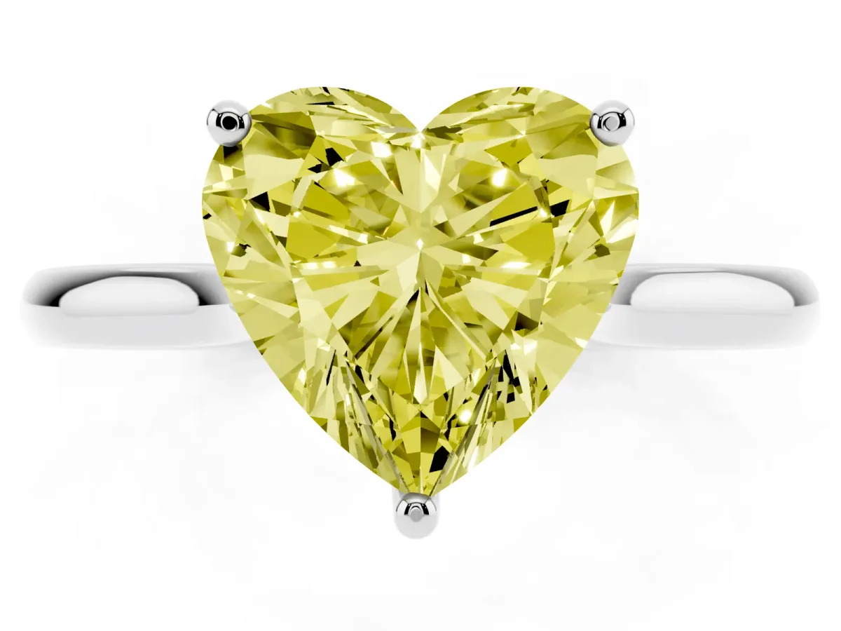 Fancy Yellow Heart Cut Cut Solitaire Ring with Cathedral Band and Four-Prong Setting Silver