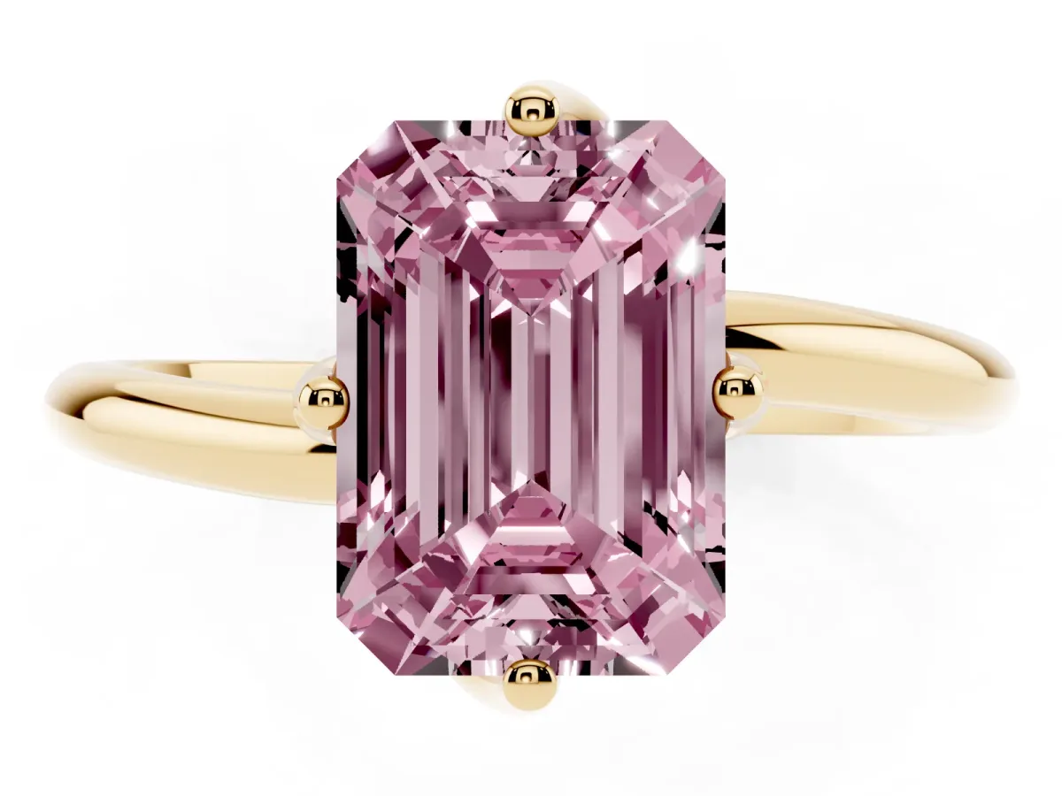 Fancy Pink Emerald Cut Diamond Solitaire Engagement Ring with Four-Prong Setting and Classic Band Yellow gold