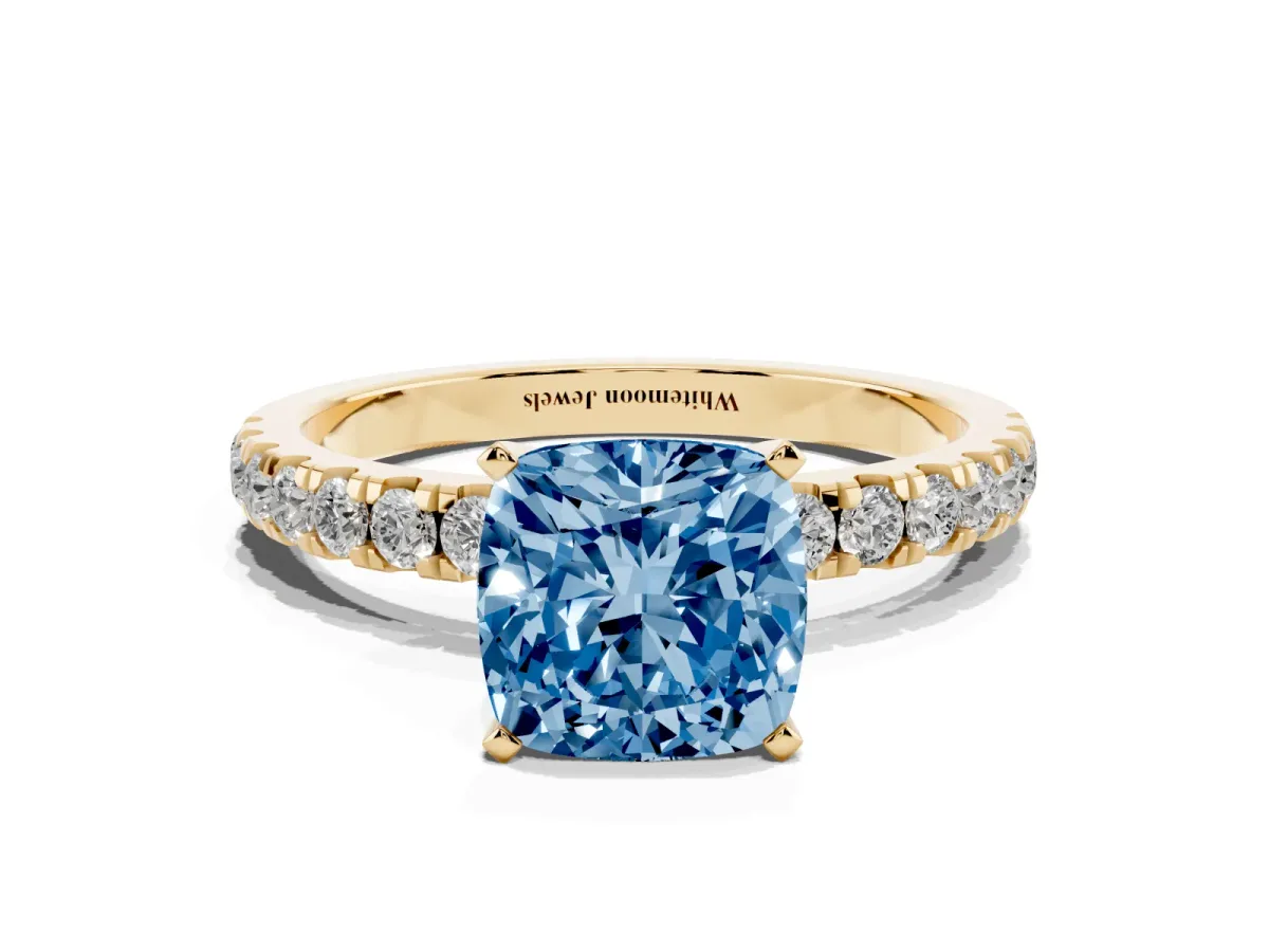 Fancy Blue Cushion Cut Diamond Solitaire Ring with Pavé Accents and Four-Prong Setting Yellow gold