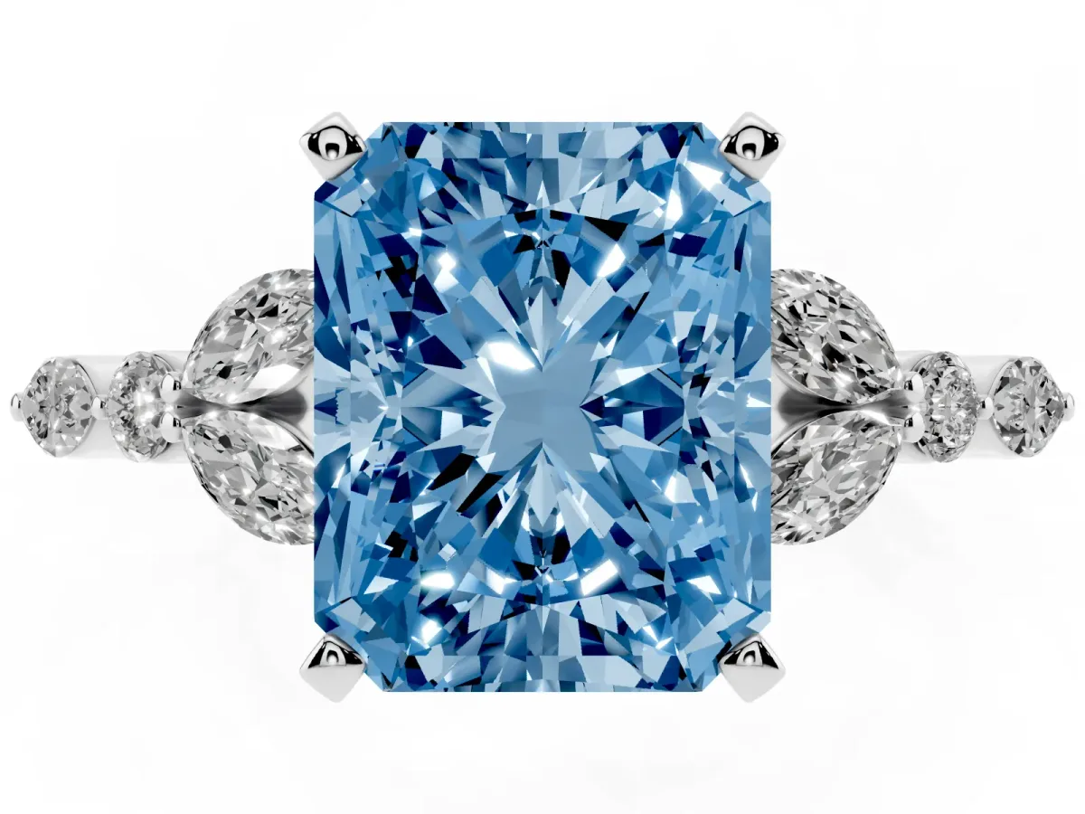 Fancy Blue Radiant Cut Diamond Solitaire Ring with Side Stones and Four-Prong Setting Platinum