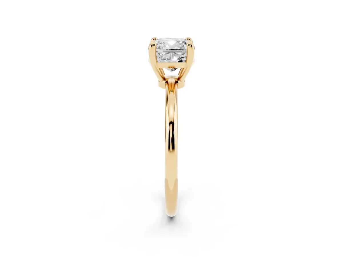 Cushion Cut Solitaire Diamond Ring with 4-Prong Setting on a Classic Band Yellow gold