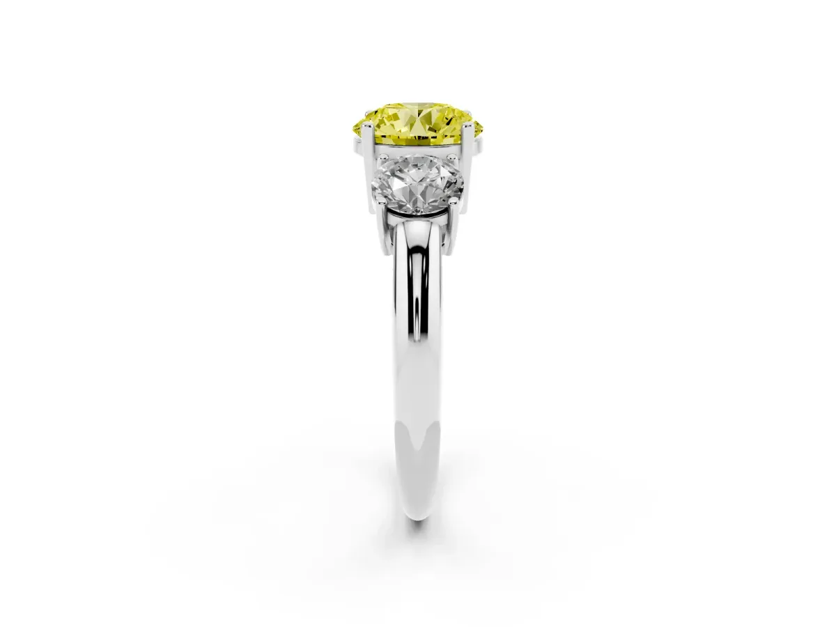 Fancy Yellow Three-Stone Round Cut Cut Diamond Engagement Ring with Prong Setting on a White Gold Band Silver
