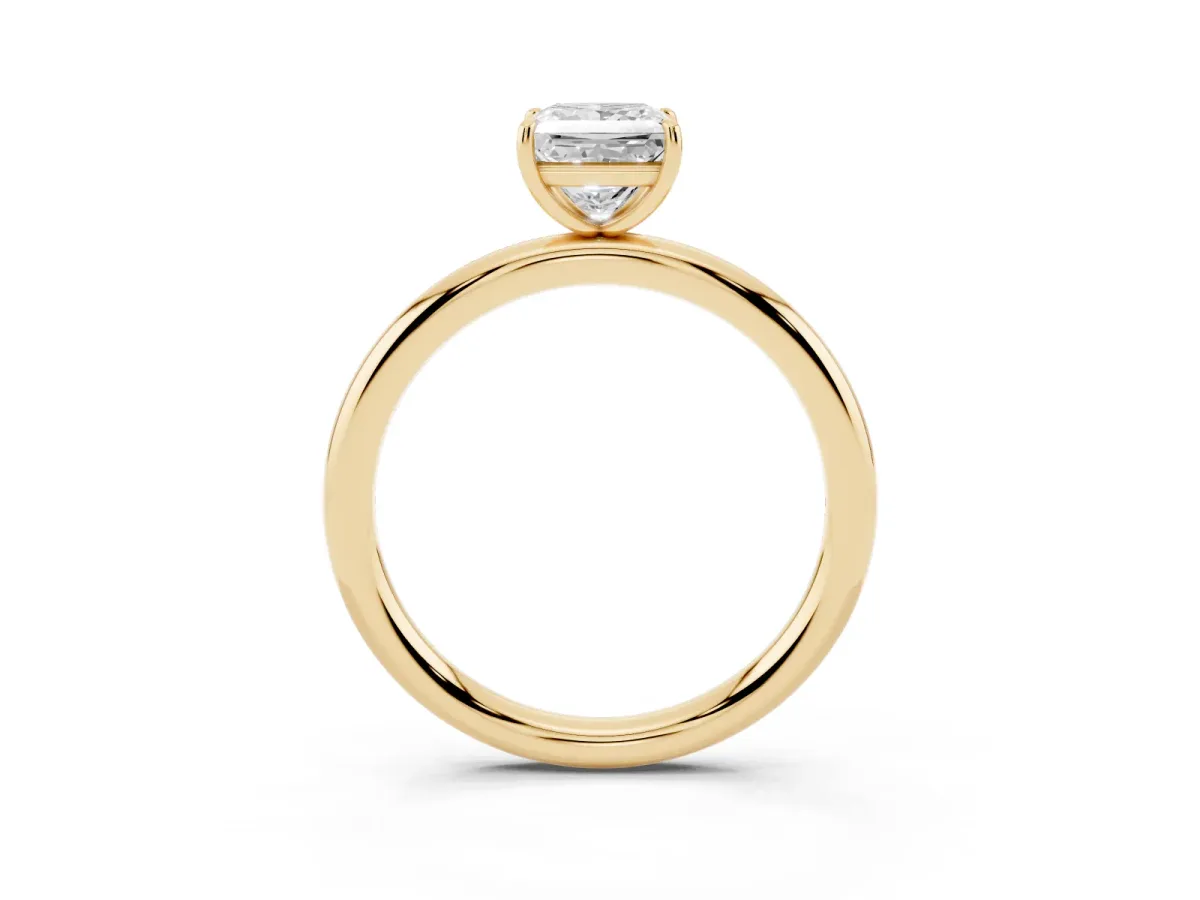 Princess Cut Solitaire Diamond Ring with Four-Prong Setting on a Plain Band Yellow gold