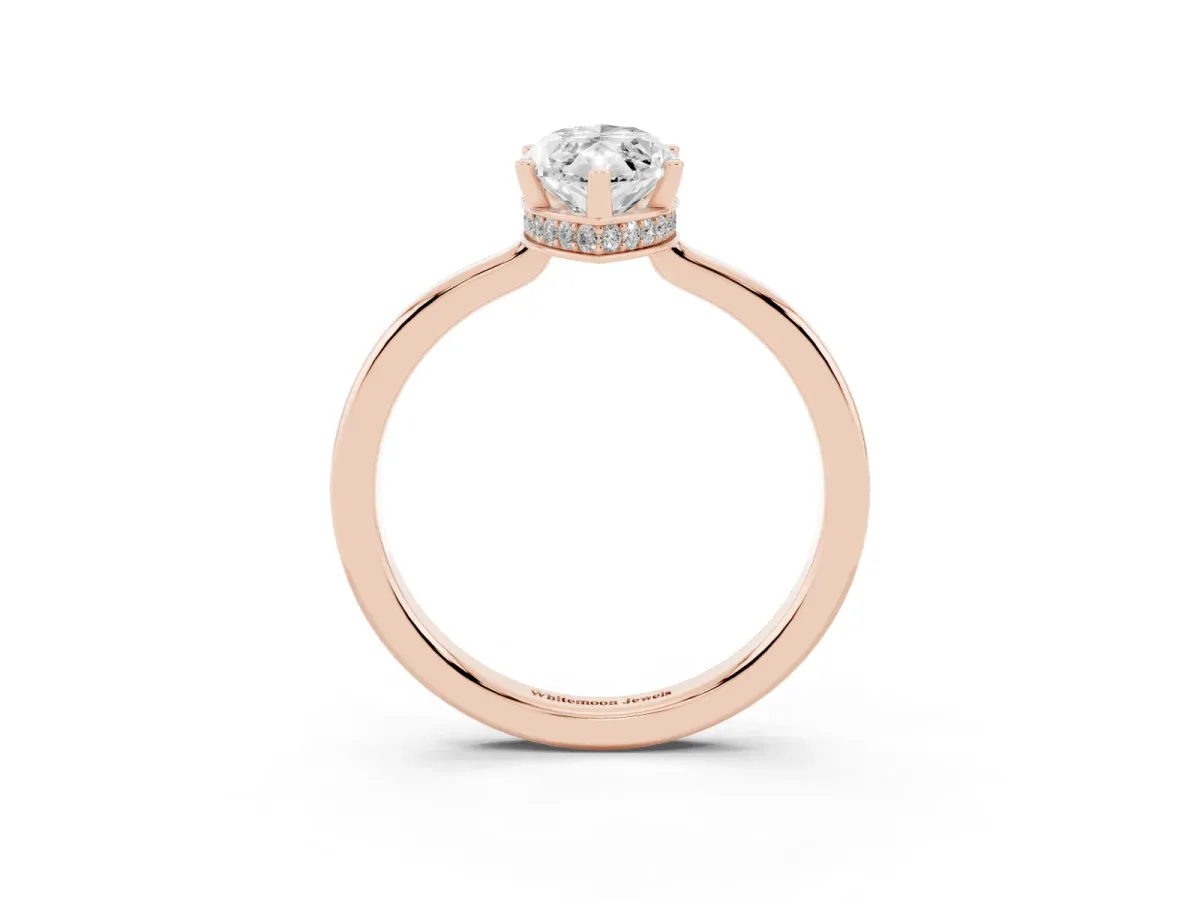 Marquise Cut Cut Solitaire Engagement Ring with Four-Prong Setting on a Classic Band Rose gold