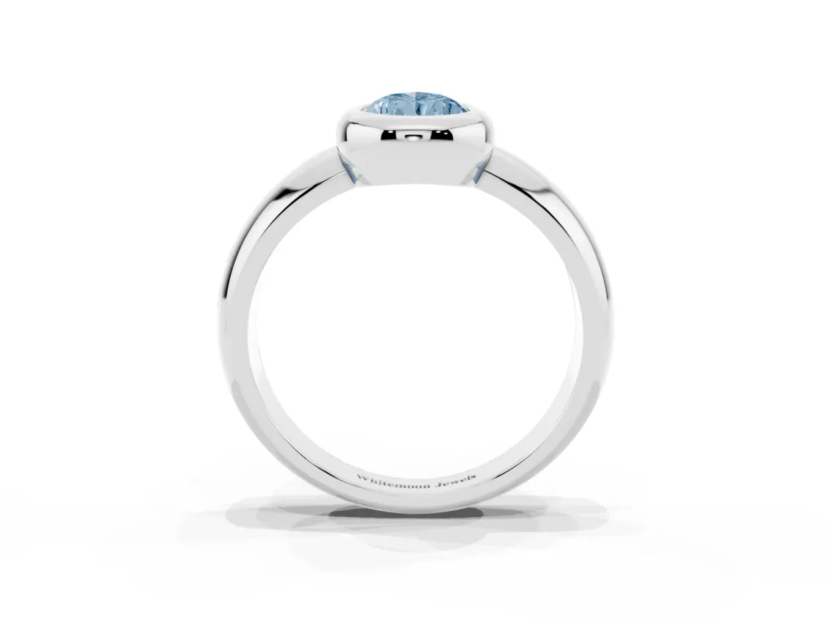 Fancy Blue Bezel Set Pear Cut Solitaire Ring with Wide Band Silver