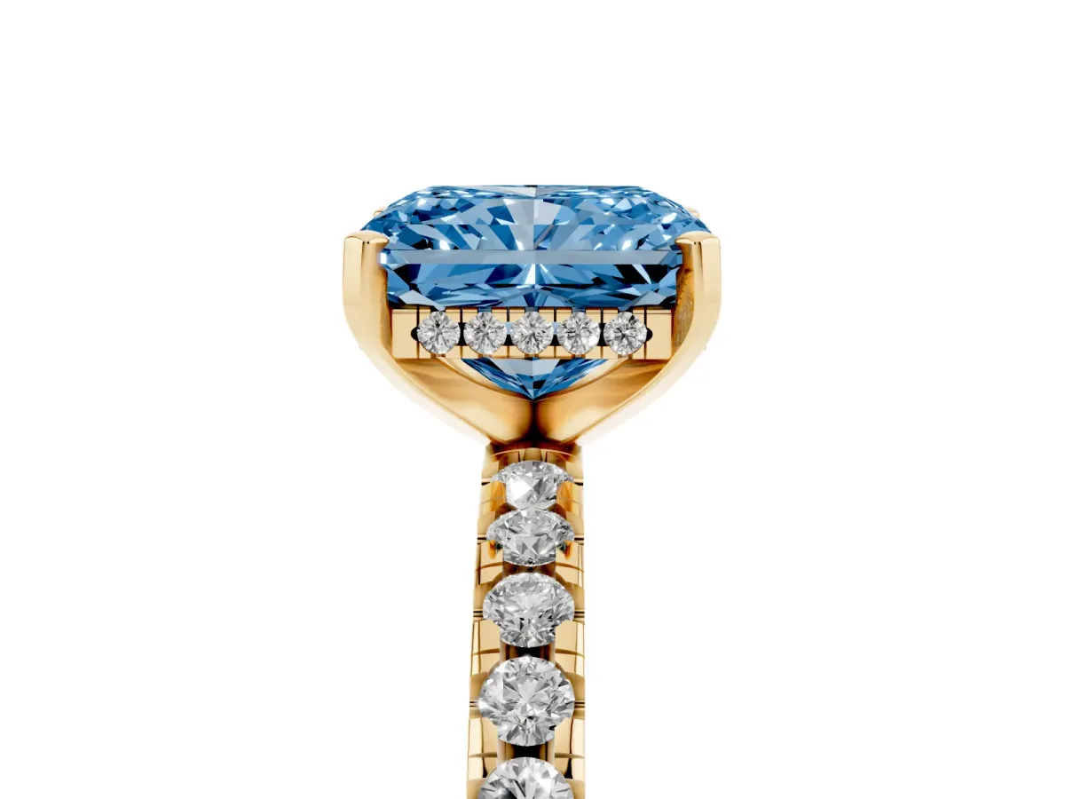 Fancy Blue Radiant Cut Diamond Solitaire Ring with Round Pavé Band and Four-Prong Setting Yellow gold