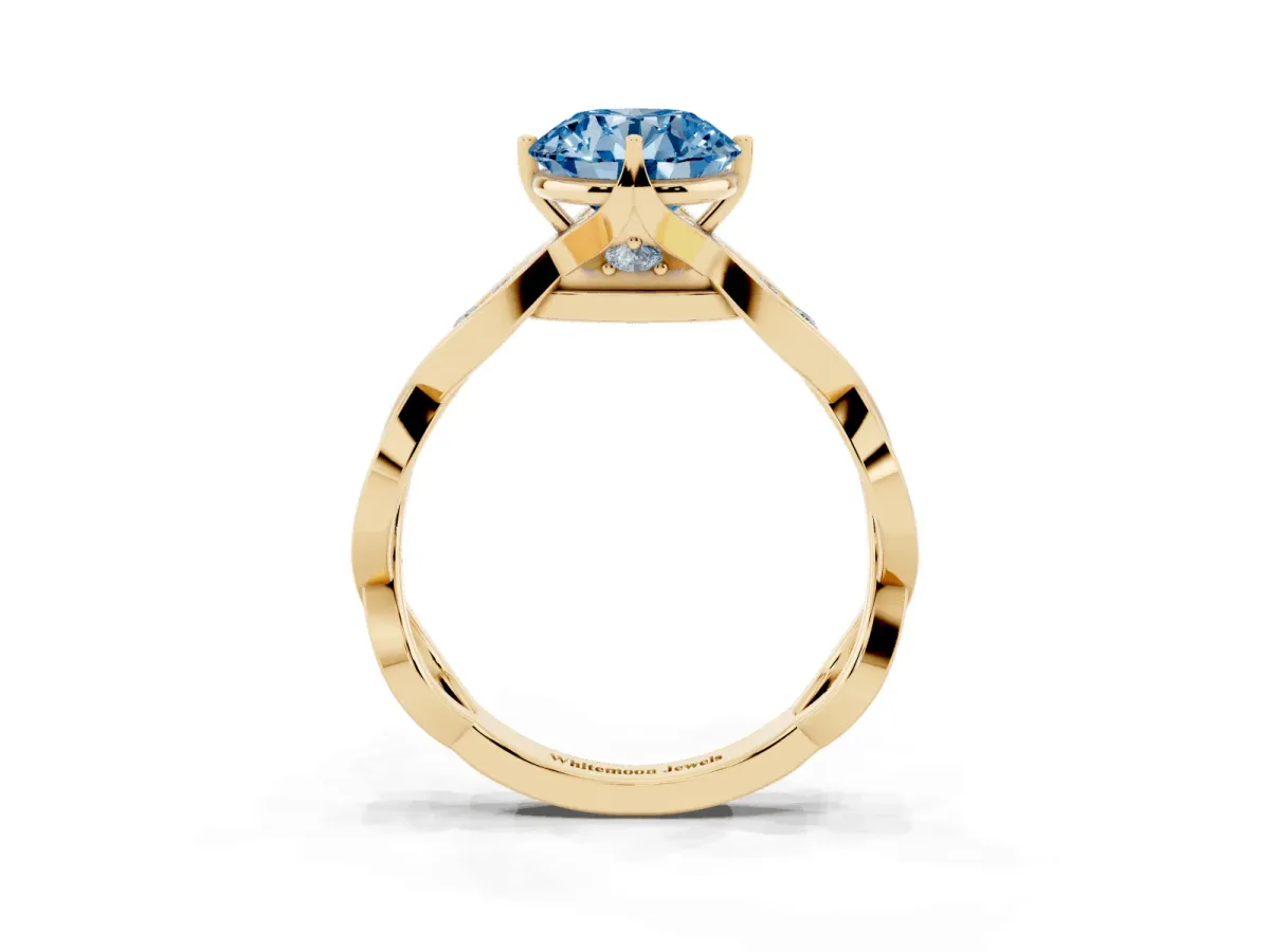 Fancy Blue Round Cut Solitaire Twist Band with Leaf Prong Setting Yellow gold