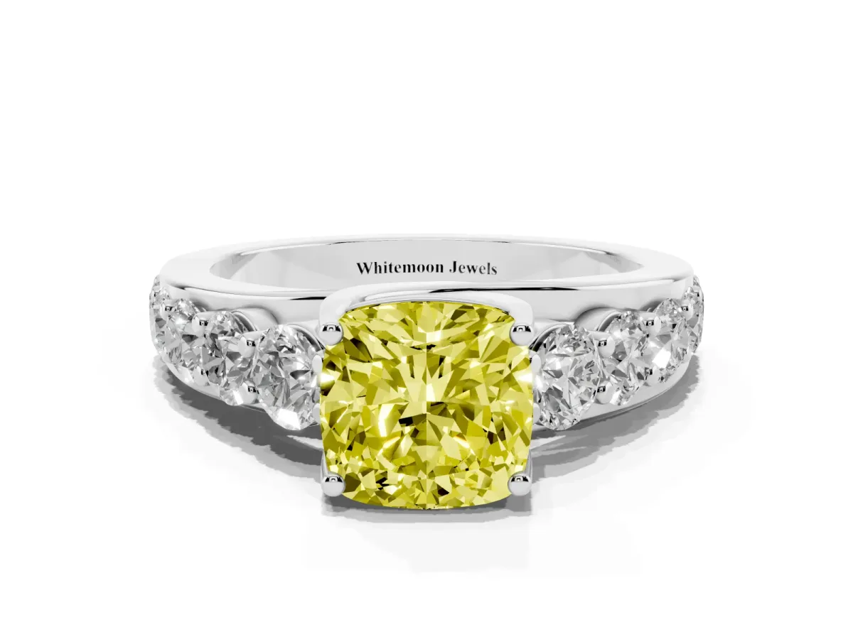 Fancy Yellow Cushion Cut Diamond Engagement Ring with Pavé Band and Four-Prong Setting Platinum