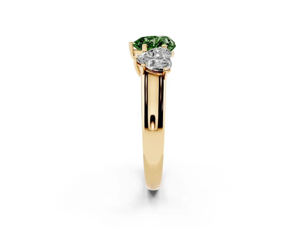 Fancy Green Heart Cut Three-Stone Diamond Ring with Prong Setting on a Classic Band Yellow gold