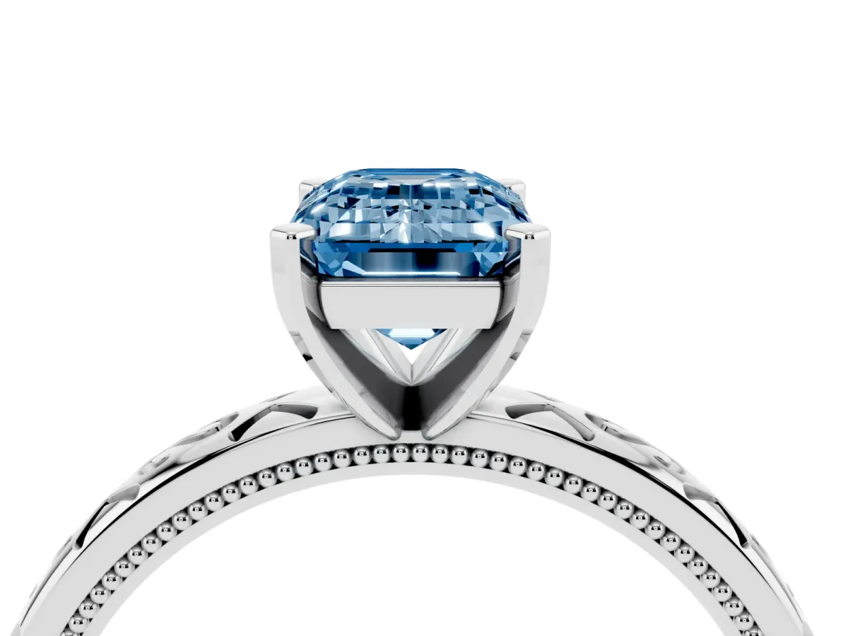 Fancy Blue Emerald Cut Solitaire Engagement Ring with Scrollwork Band and Four-Prong Setting White gold