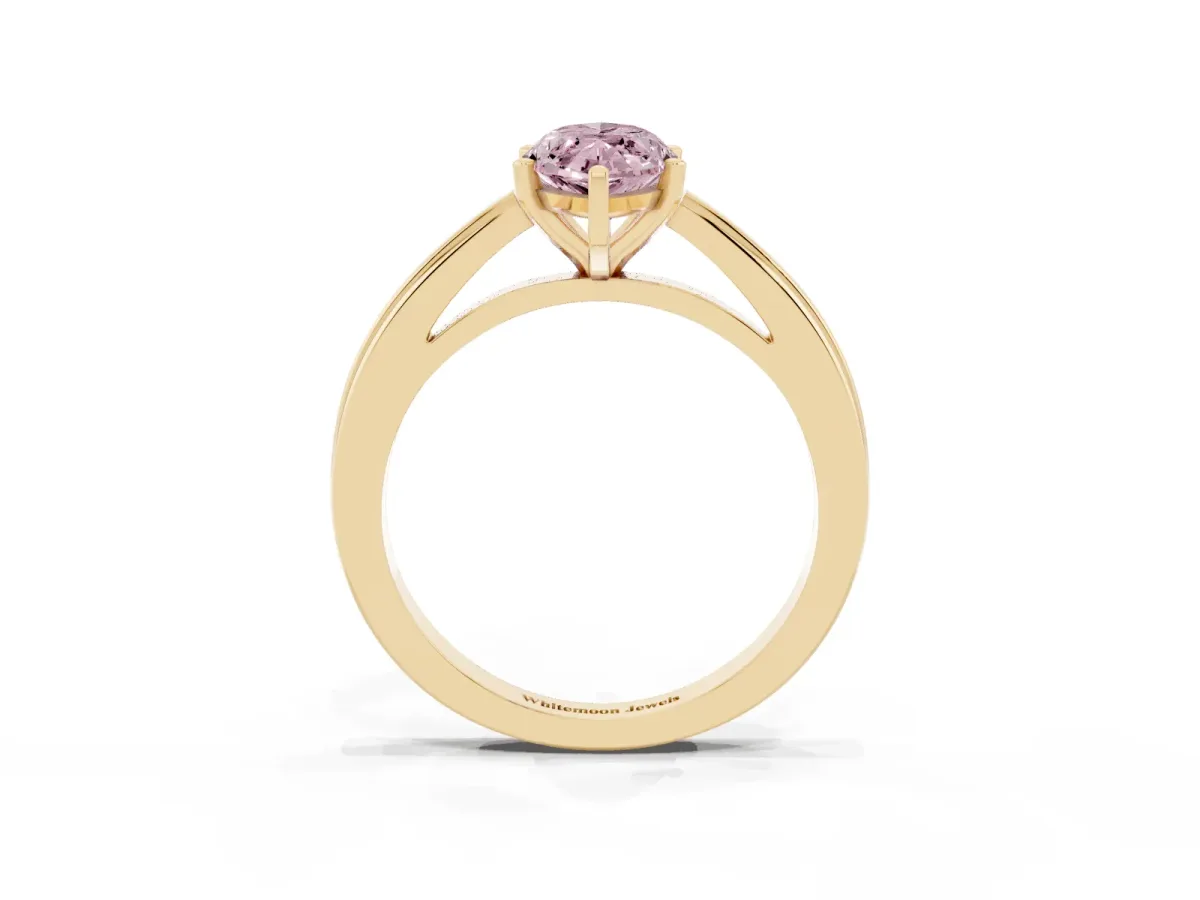 Fancy Pink Marquise Cut Solitaire Diamond Ring with Four-Prong Setting and Classic Band Yellow gold
