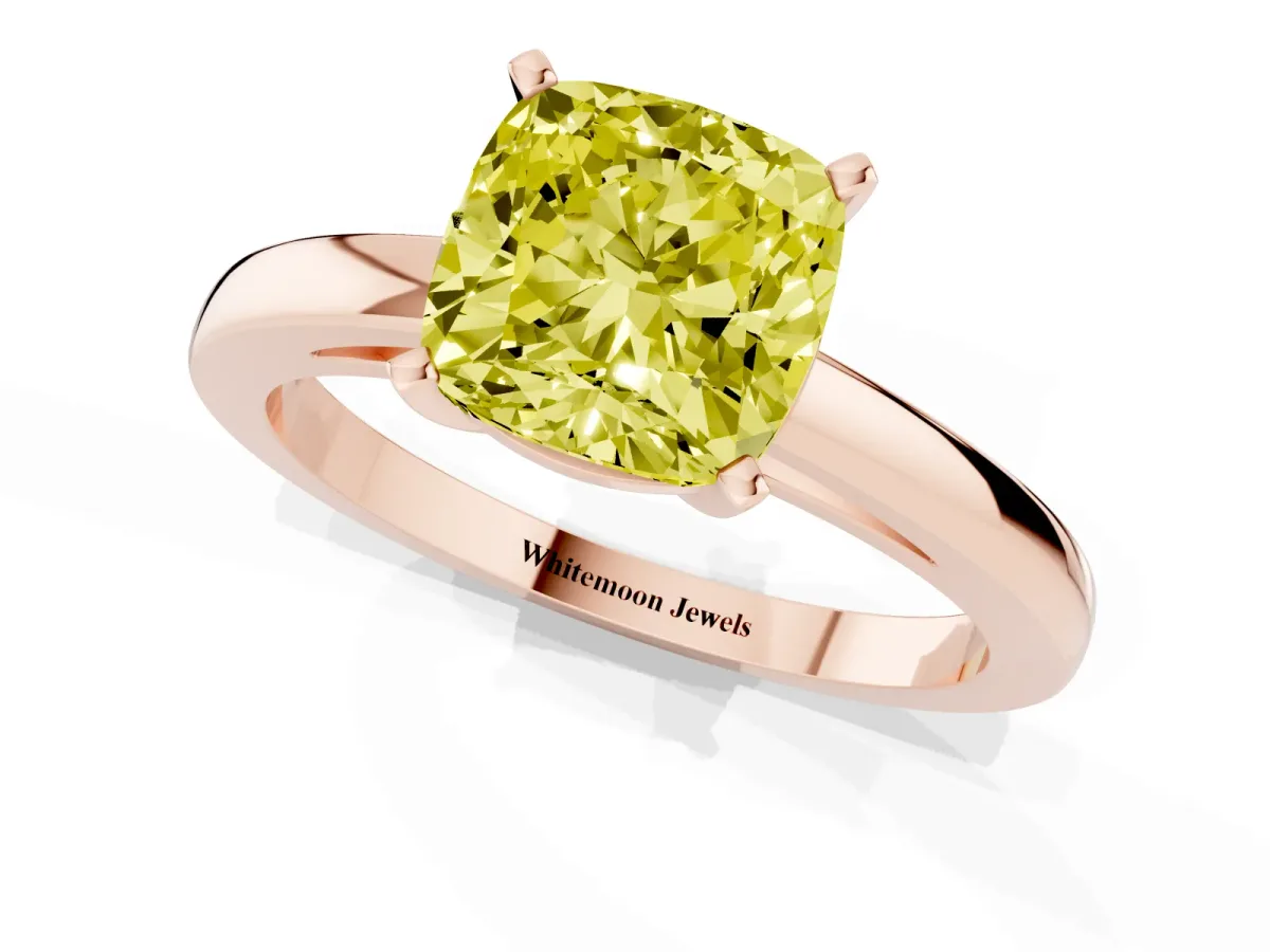 Fancy Yellow Cushion Cut Solitaire Diamond Engagement Ring with Four-Prong Setting on a Classic Band Rose gold