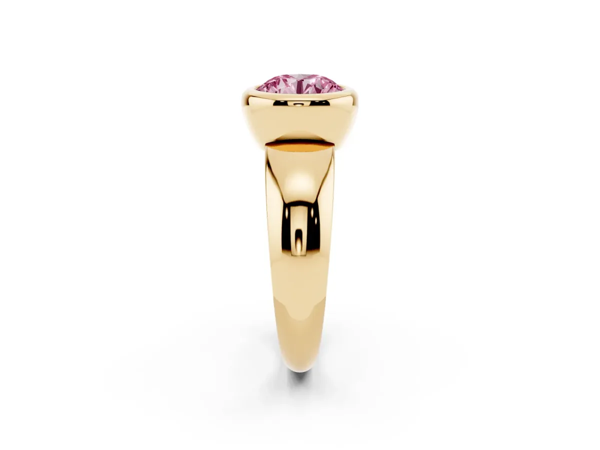 Fancy Pink Bezel Set Round Cut Solitaire Ring with Wide Band Yellow gold