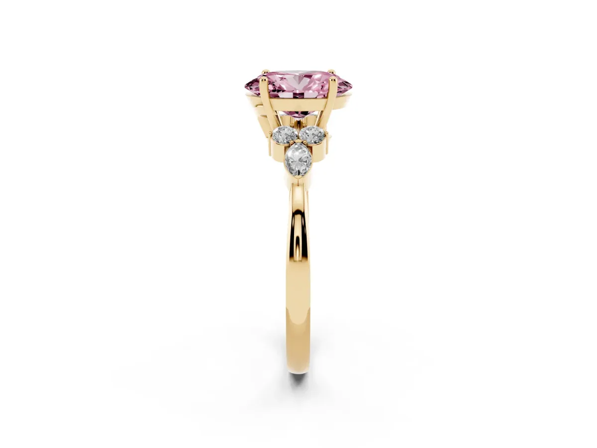Fancy Pink Oval Cut Brilliant Diamond Solitaire Ring with Pear Side Stones and Four-Prong Setting Yellow gold