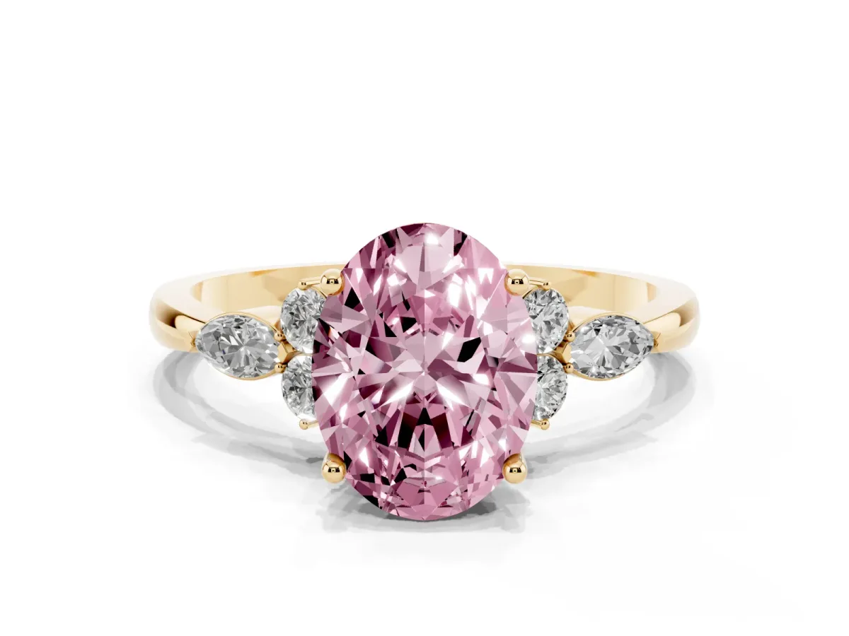 Fancy Pink Oval Cut Brilliant Diamond Solitaire Ring with Pear Side Stones and Four-Prong Setting Yellow gold