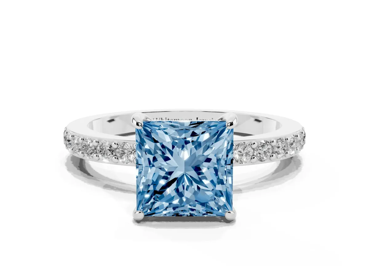 Fancy Blue Princess Cut Diamond Pavé Engagement Ring with Round Accents and Prong Setting Platinum