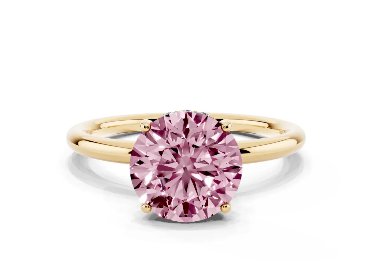 Fancy Pink Round Cut Solitaire Diamond Ring with a Classic Band and Four-Prong Setting Yellow gold