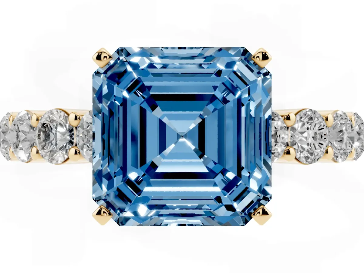 Fancy Blue Asscher Cut Diamond Solitaire Ring with Shared Prong Round Side Stones Yellow gold
