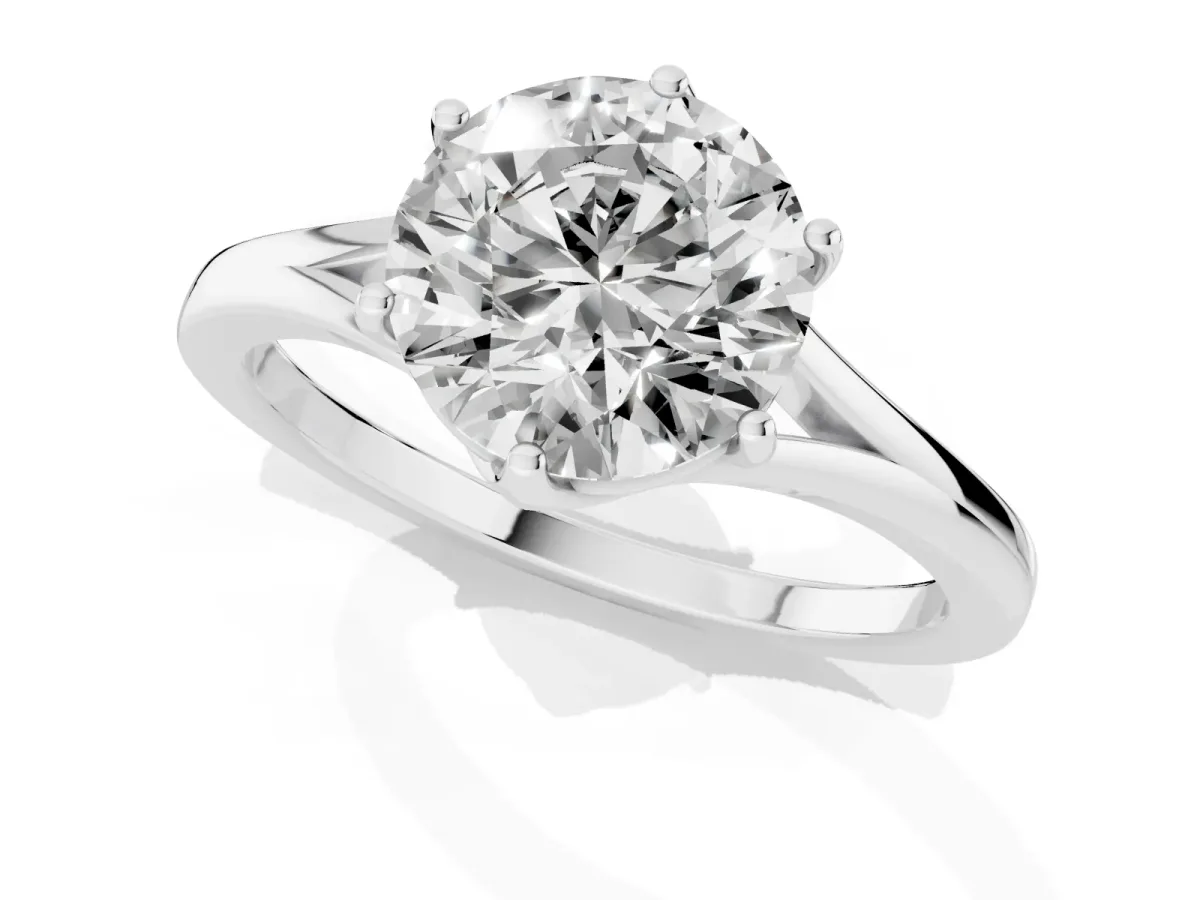 Round Cut Solitaire Diamond Ring with Six-Prong Setting and Tapered Band White gold