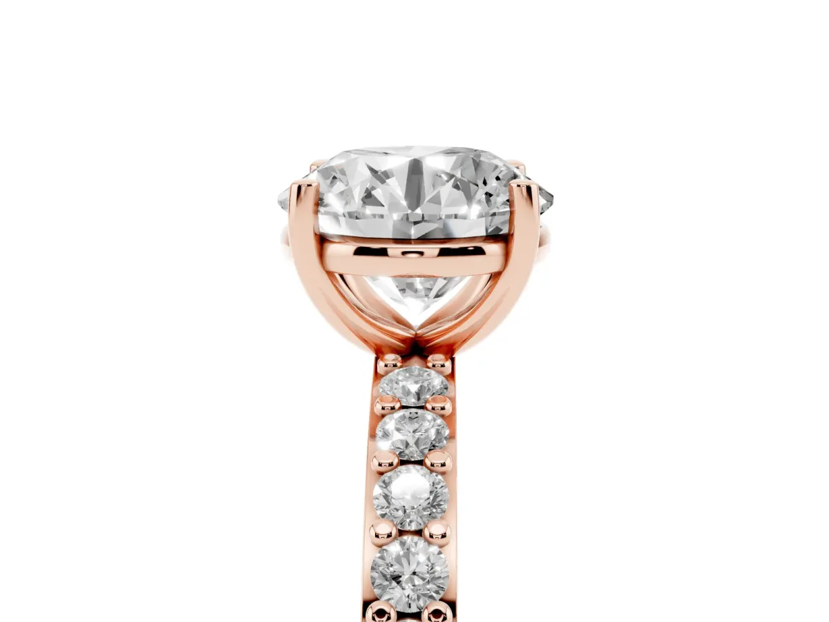 Round Cut Cut Diamond Solitaire with Pave Band and Four-Prong Setting Rose gold