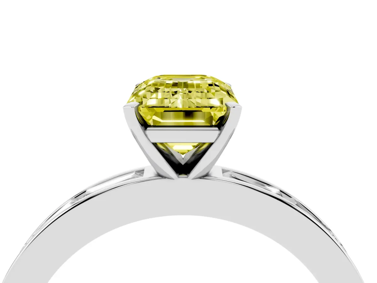 Fancy Yellow Emerald Cut Solitaire Diamond Ring with Channel-Set Baguette Band and Four-Prong Setting White gold