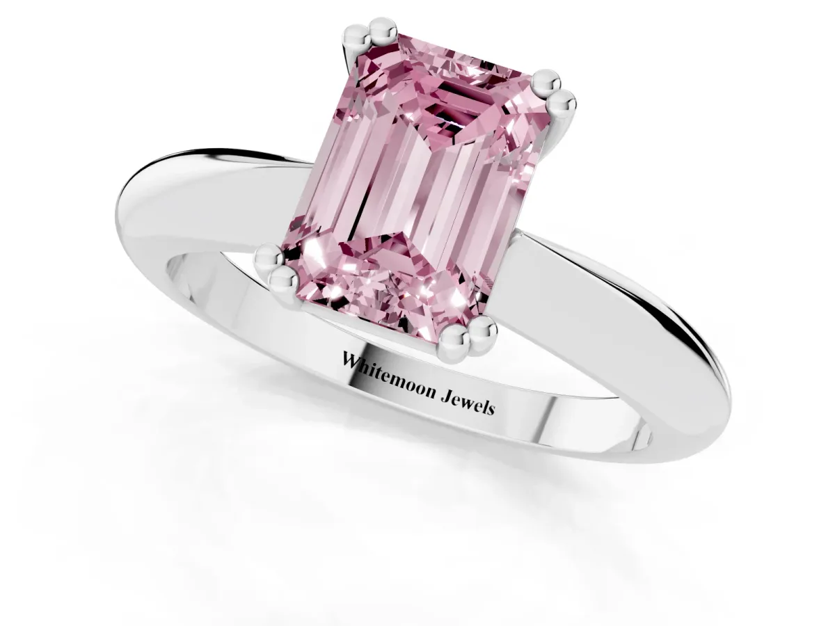 Fancy Pink Emerald Cut Cut Solitaire Engagement Ring with Tapered Band and Four-Prong Setting Platinum